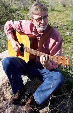 R. Mark Fogelson and his guitar